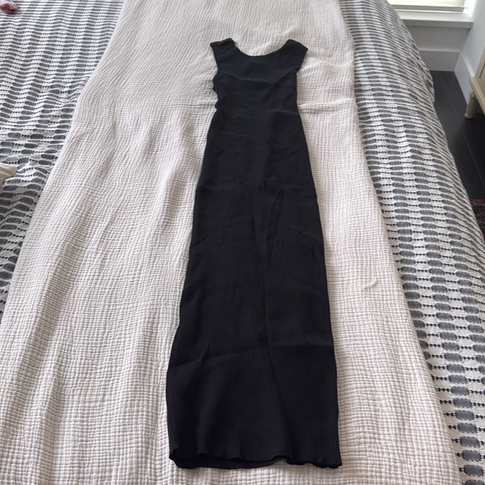 Black bodycon midi dress. Detailed open back. Size M
